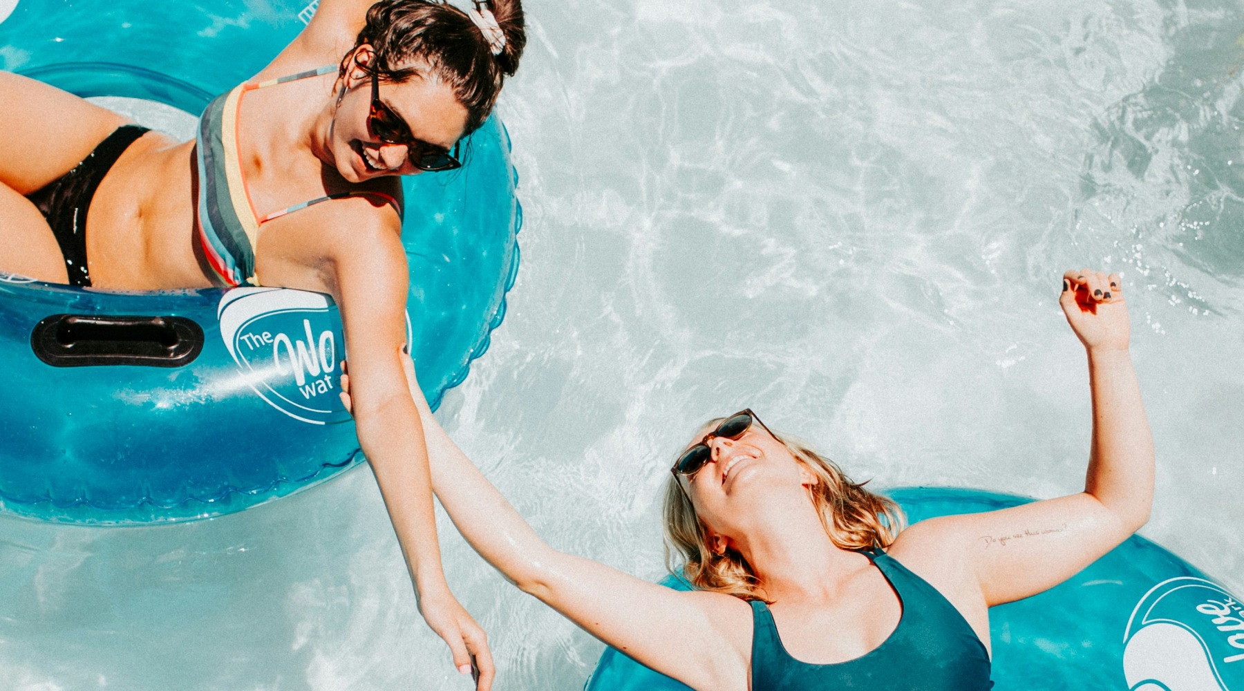 a couple of friends in a pool