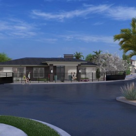 Settle into comfort at Rev3 at Avondale Station a building with a parking lot and trees in front of it