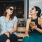 women sitting on a bench