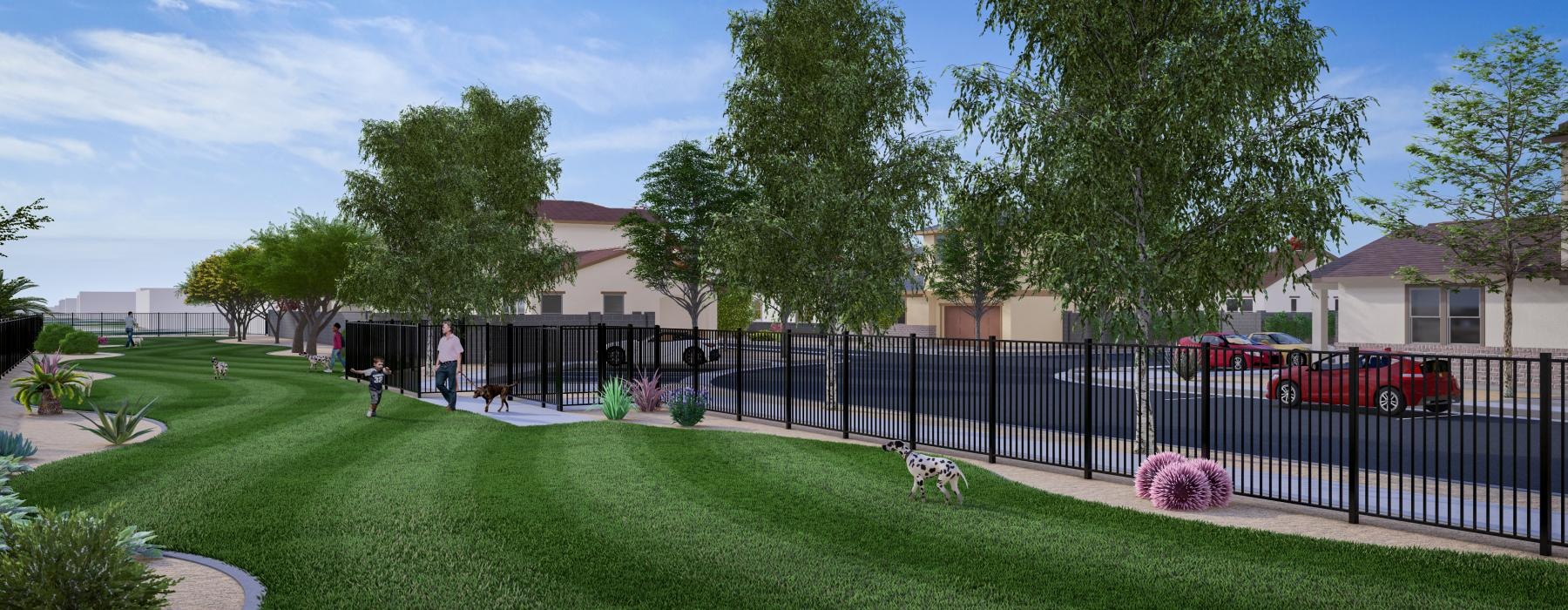 a fenced in lawn with a dog and people walking around