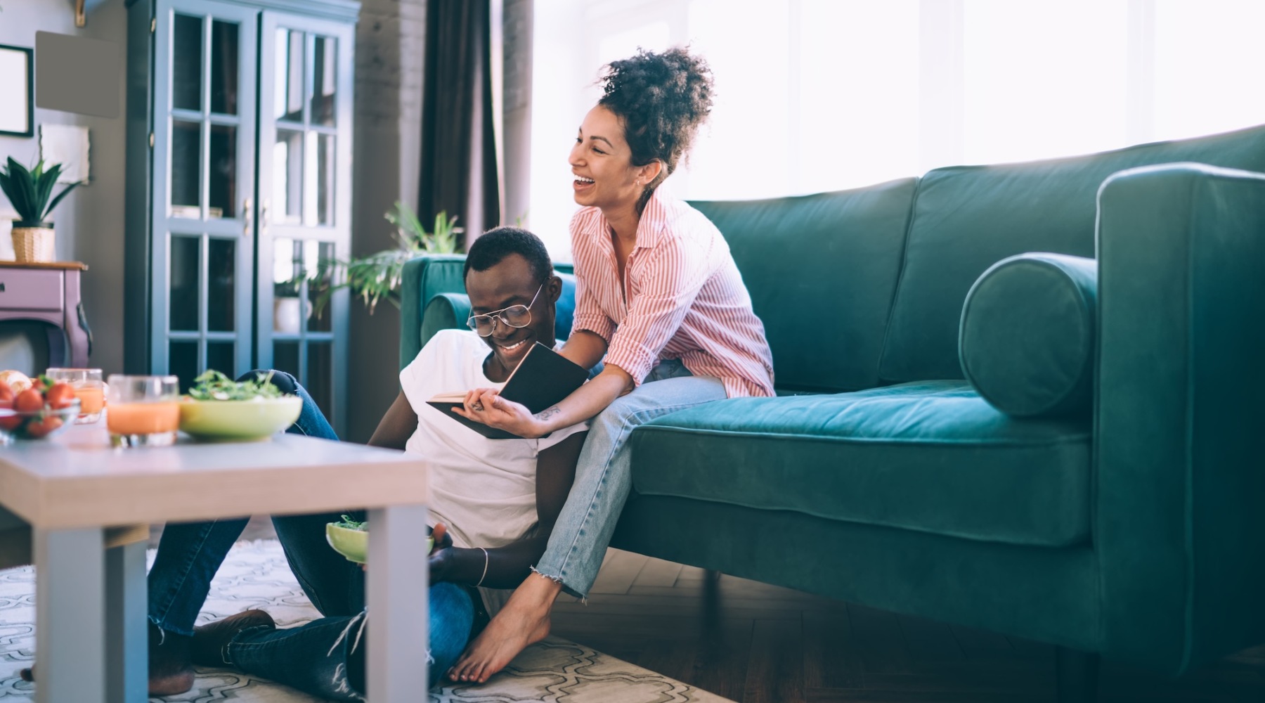 a couple in a bright living room